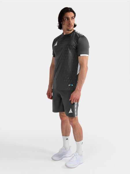 Full-length view of the Anthracite training kit on-model, demonstrating the professional training range