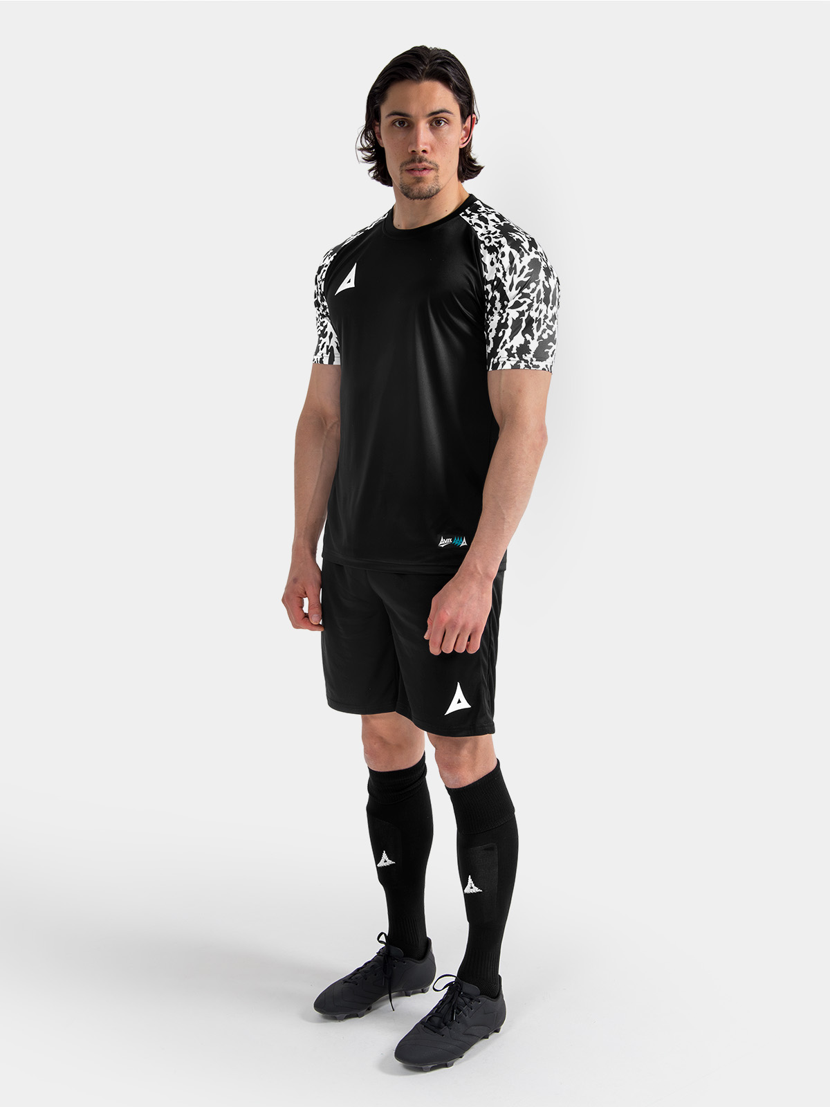 full-length view of the black classic pro kit, demonstrating a professional club aesthetic.