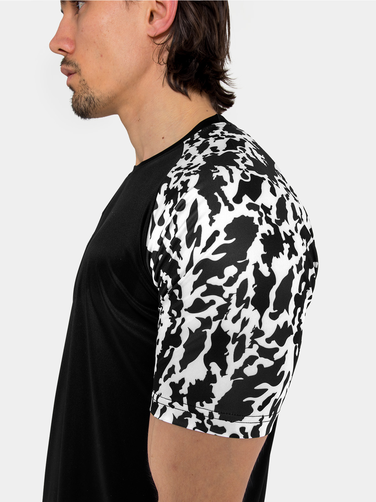 close-up of the black-on-black sublimated camo detail for a disruptive modern look.