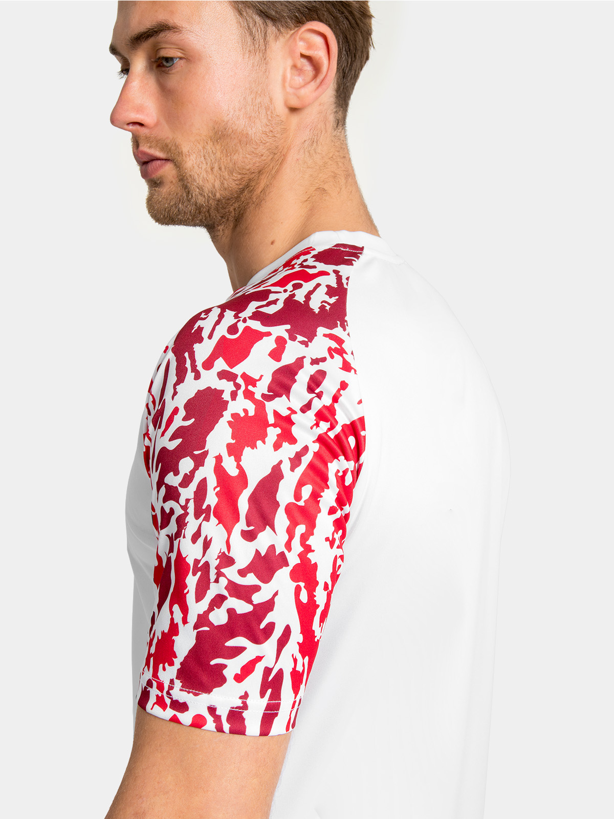view of the intricate red sublimated camo design on the sleeves of the classic pro jersey.