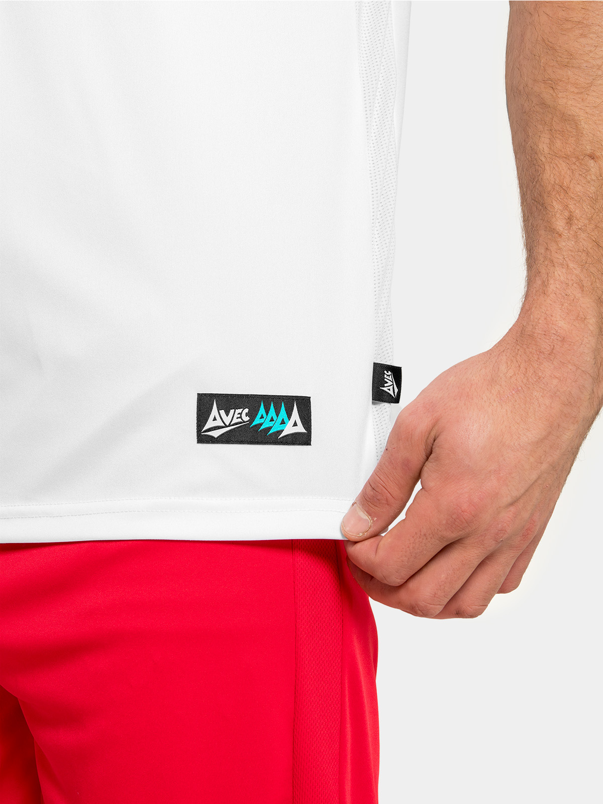 technical close-up of the red mesh ventilation panel and the official woven authentic id label at the hem.