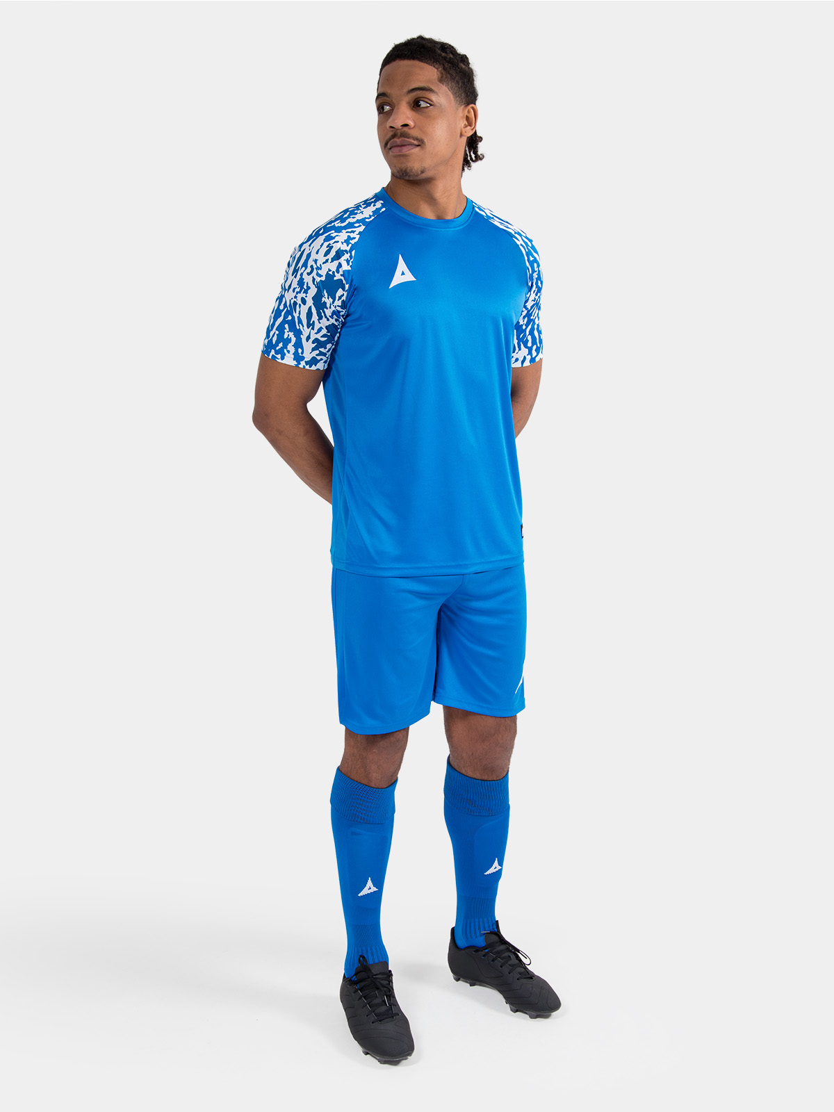 full-length view of the royal blue classic pro kit, demonstrating a professional and cohesive teamwear look.