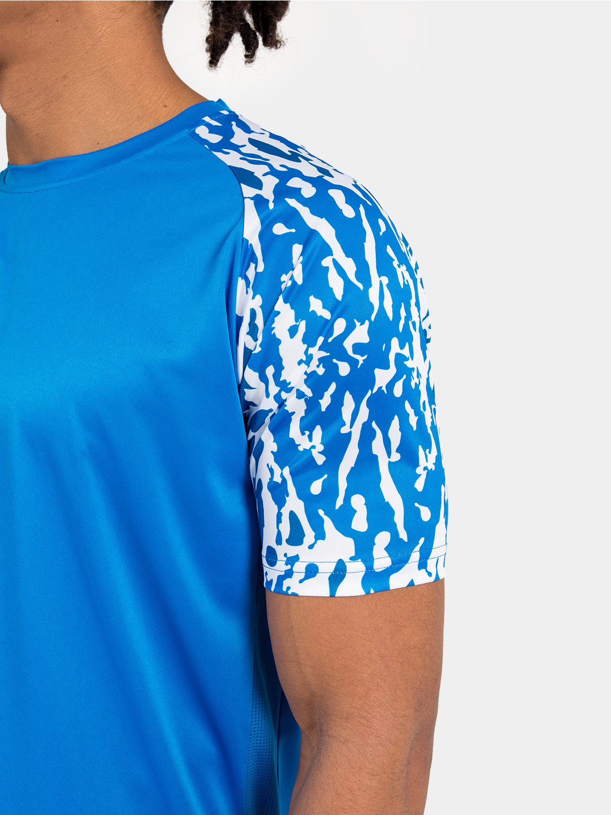 detailed perspective of the royal blue sublimated camo pattern, providing a high-end finish to the sleeves.