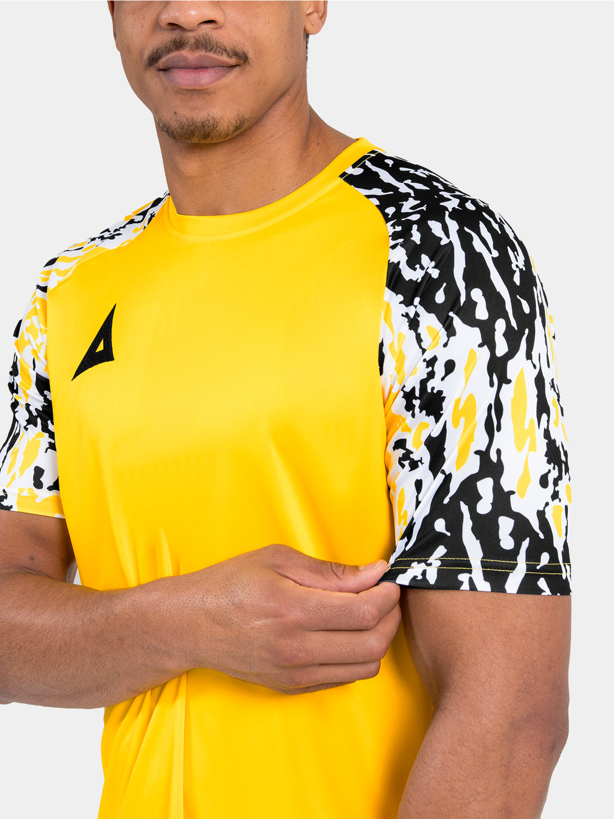 close-up of the tonal yellow sublimated camo detail, providing a high-end finish to the sleeves.