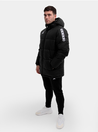 black padded football jacket with hood and sleeve branding – designed to be worn pitchside by grassroots player in teamwear style