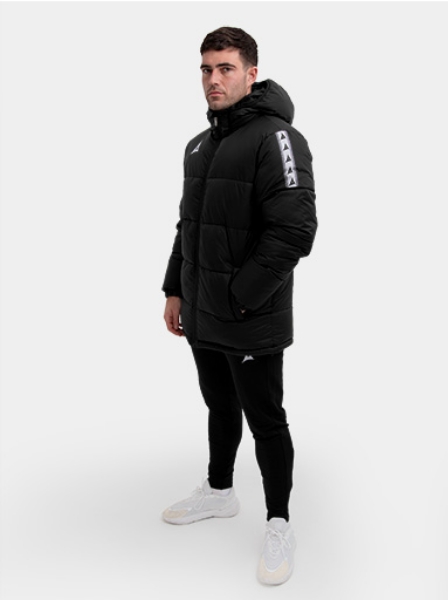 Black padded football jacket with hood and sleeve branding – designed to be worn pitchside by grassroots player in teamwear style