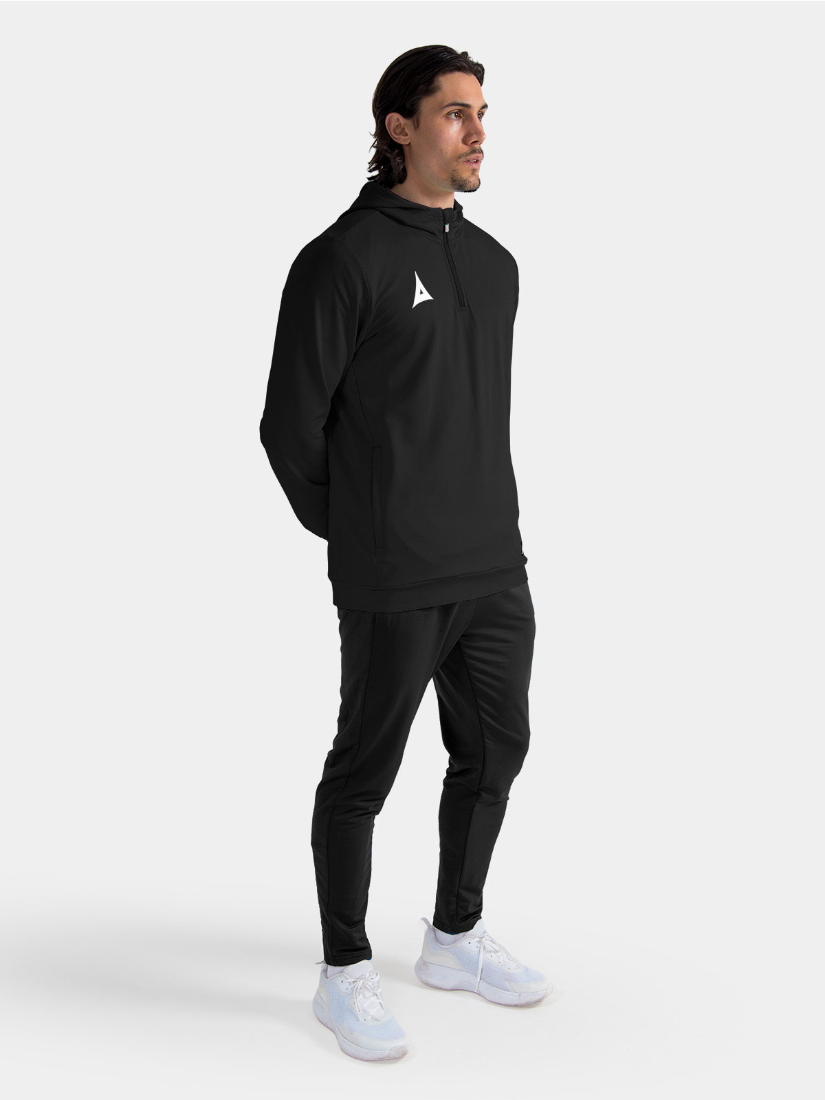 full-length shot of the black focus 2 training uniform, featuring the qz hoody for a unified squad appearance.