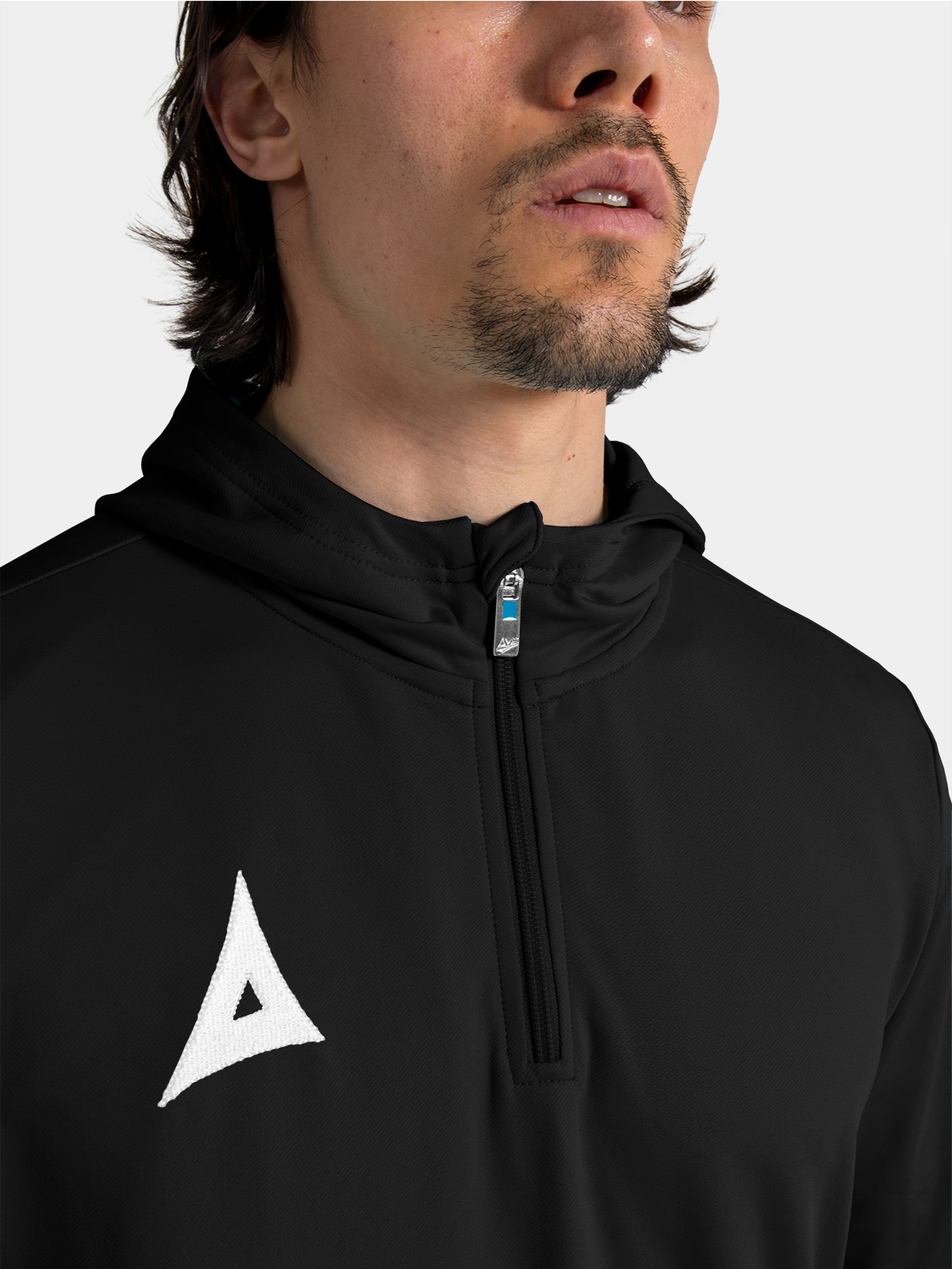 black focus 2 hoody zipped up, showing the streamlined fit and contrast white embroidered logo.