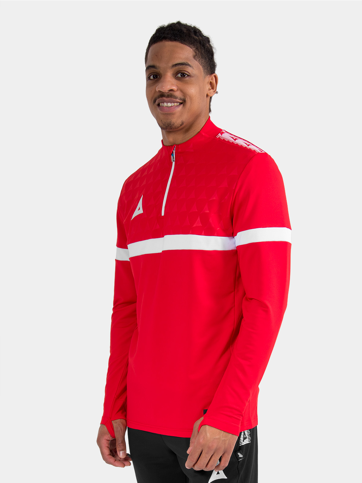 athlete wearing the red evolve pro overlay, demonstrating the lightweight feel and unrestricted range of motion.