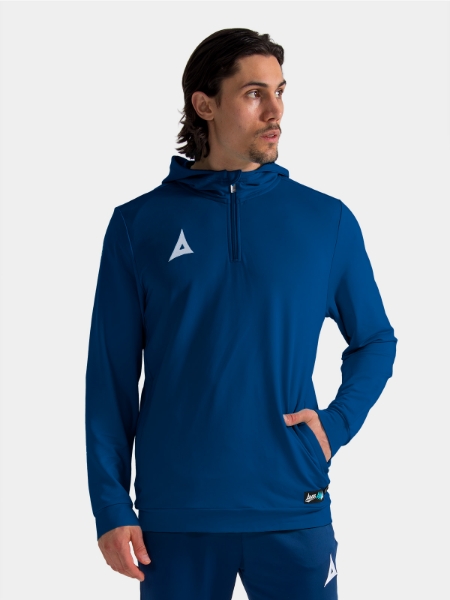 Coach wearing the Navy Focus 2 QZ Hoody, demonstrating the smart and functional sideline aesthetic.
