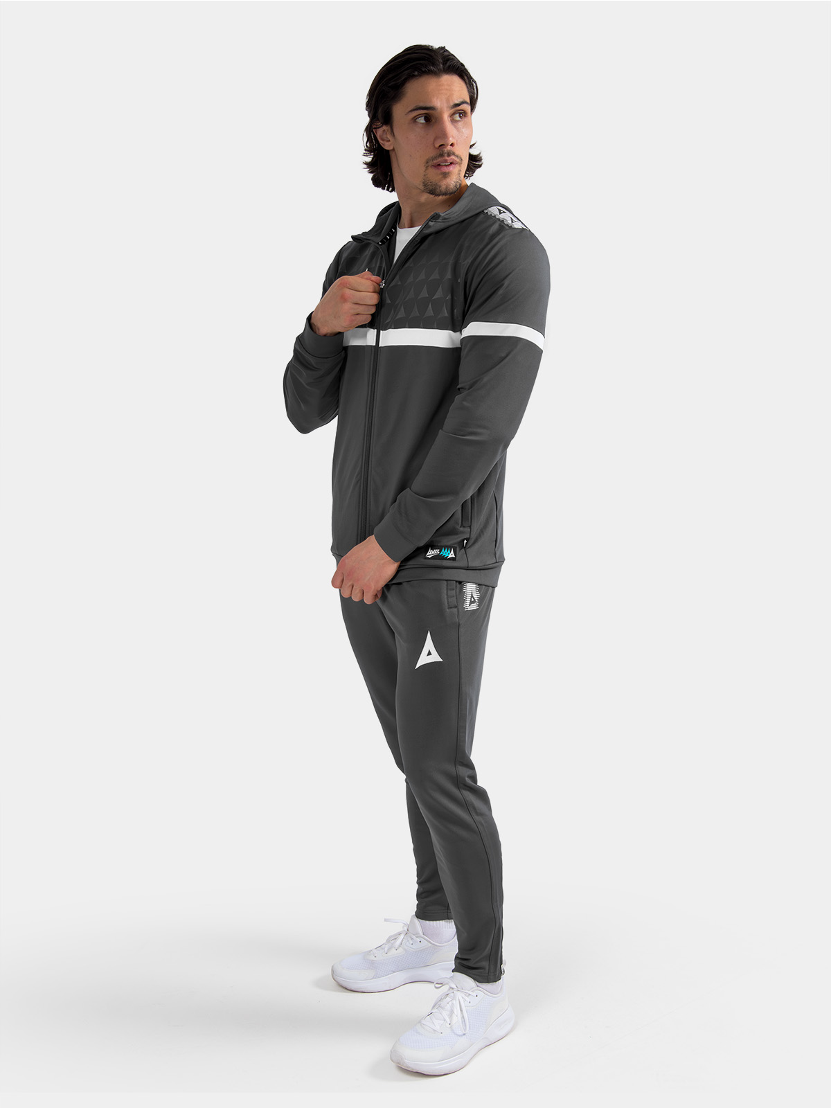 complete matchday travel look in anthracite, displaying the evolve pro fz hoody as a professional outer layer.