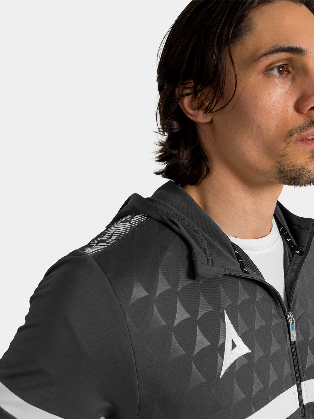 close up view, showcasing the debossed 'a' logo. 