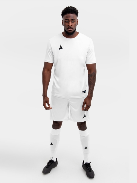 The person in the shoot is wearing a full white kit, but the shirt can also be worn with black shorts