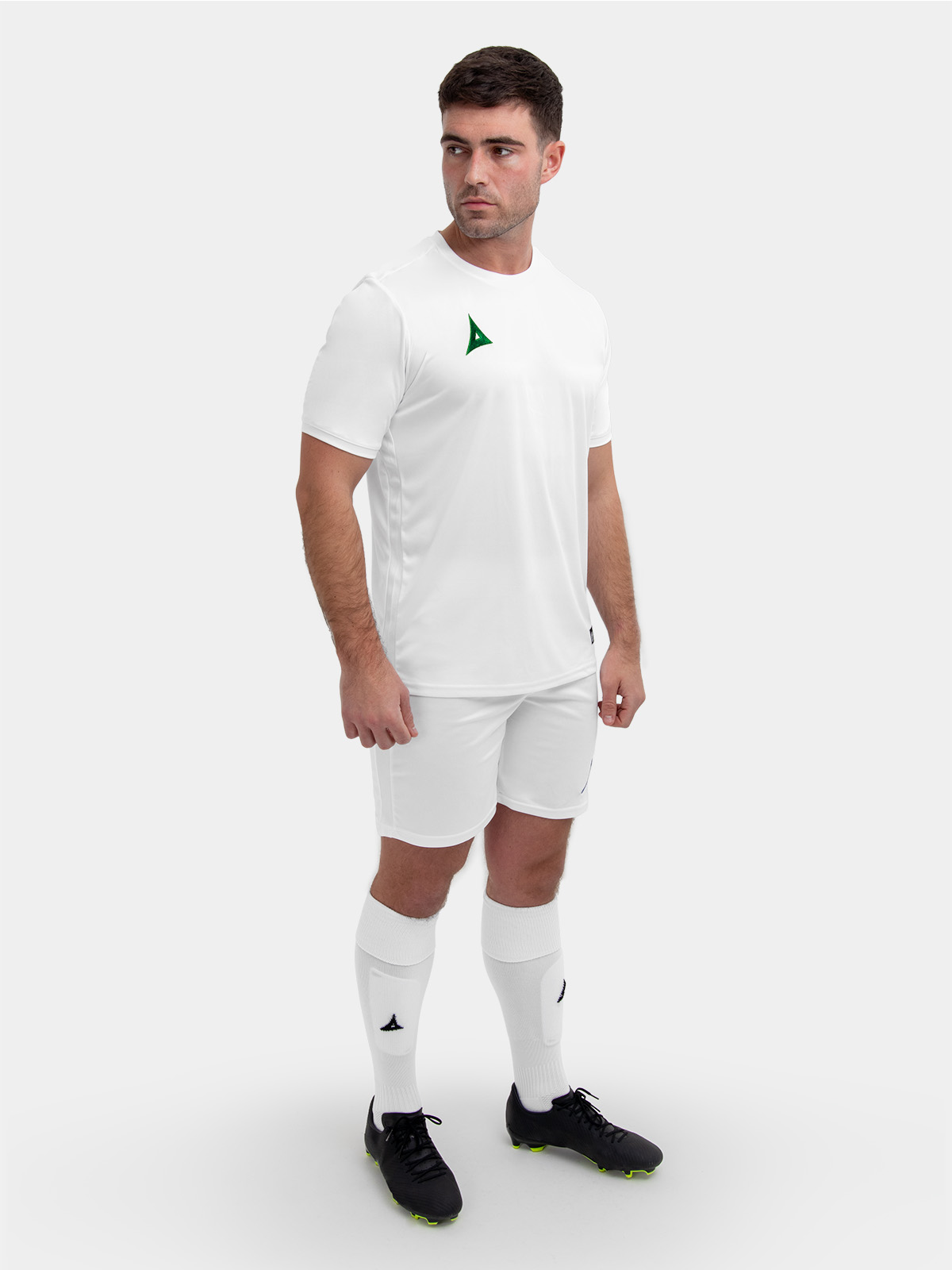 the man is wearing a white shirt with green logos