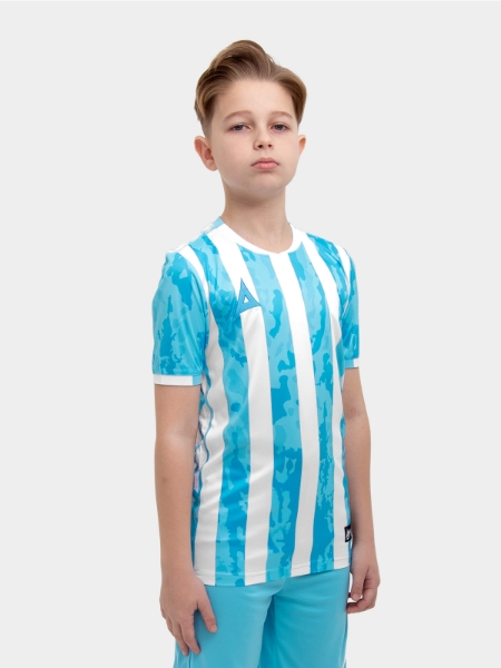 A kid is wearing a Sky Blue and White stripe shirt, which resembles the likes of the Argentina National team. There is a camo pattern within the sky blue elements