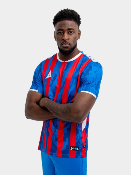 Model wearing a Red and royal blue stripe Sports football training t-shirt.
