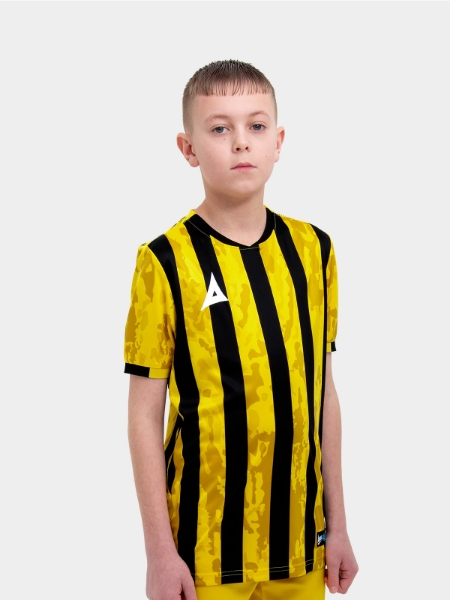 A kids football kit in yellow and black with stripes and a camo pattern