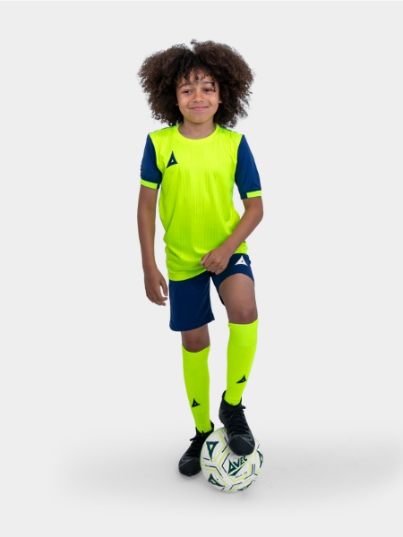 Stand out in the new Neon Yellow football kit from Avec Sport. The junior is modelling a neon yellow shirt with navy sleeves, and is combined with navy shorts and neon yellow socks.