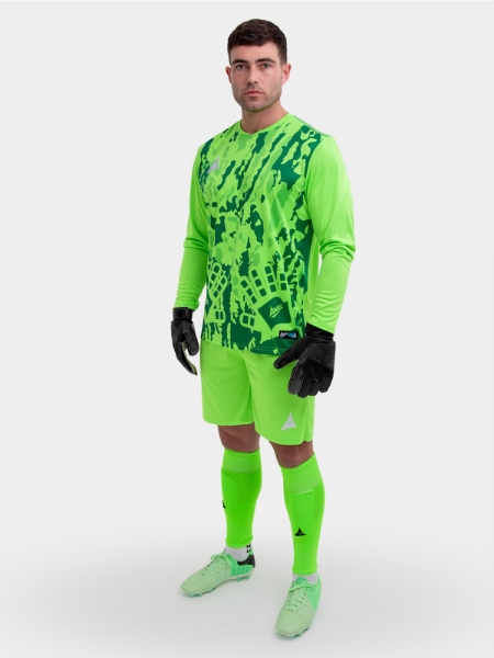A model standing up wearing a neon green goalkeeper football shirt, neon green Shorts and neon green Football Socks.