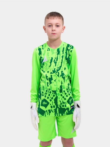 	A kid wearing a neon green goalkeeper football shirt with a camo pattern
