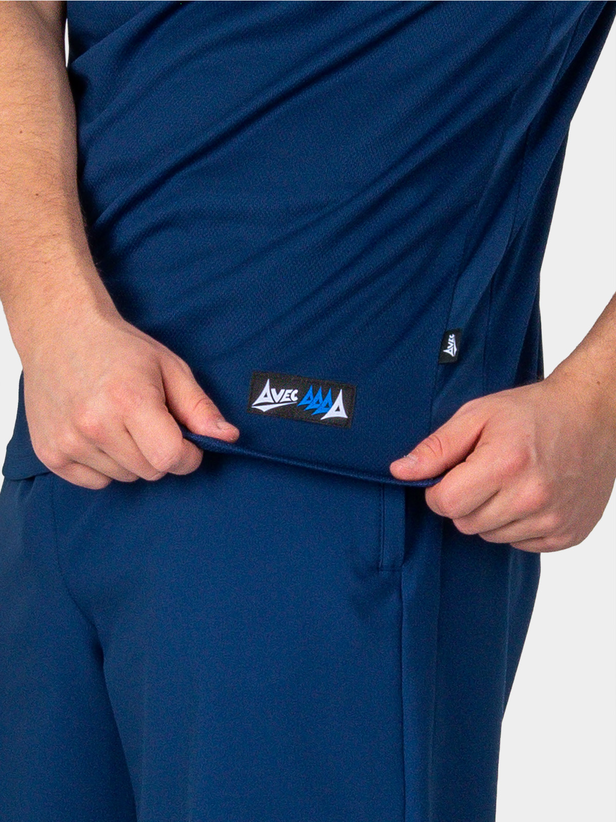 close-up of authentic sportswear id label on the avec focus 2 navy tech polo