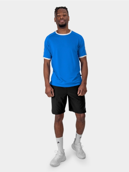 	A Male Model is stood wearing the Avec Evolve Royal Blue T-Shirt, and Black Avec Focus 2 Tech Shorts and Avec Grip socks in white