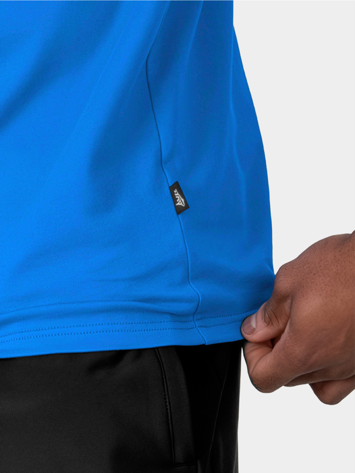 close-up of authentic sportswear id label on the avec evolve royal blue t-shirt