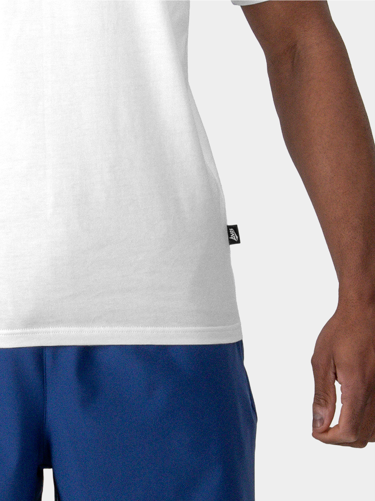 close-up of authentic sportswear id label on the avec evolve white t-shirt	
