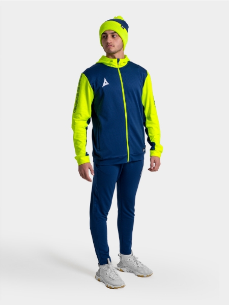 Person in Navy Blue and Neon Yellow Athletic Outfit