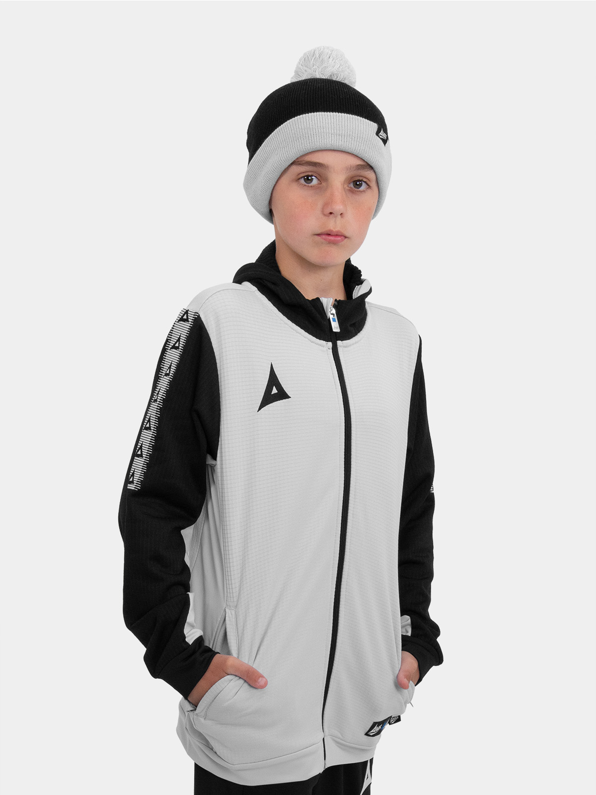 a kids beanie hat in black and grey, which is designed to be worn with our grey pro player collection