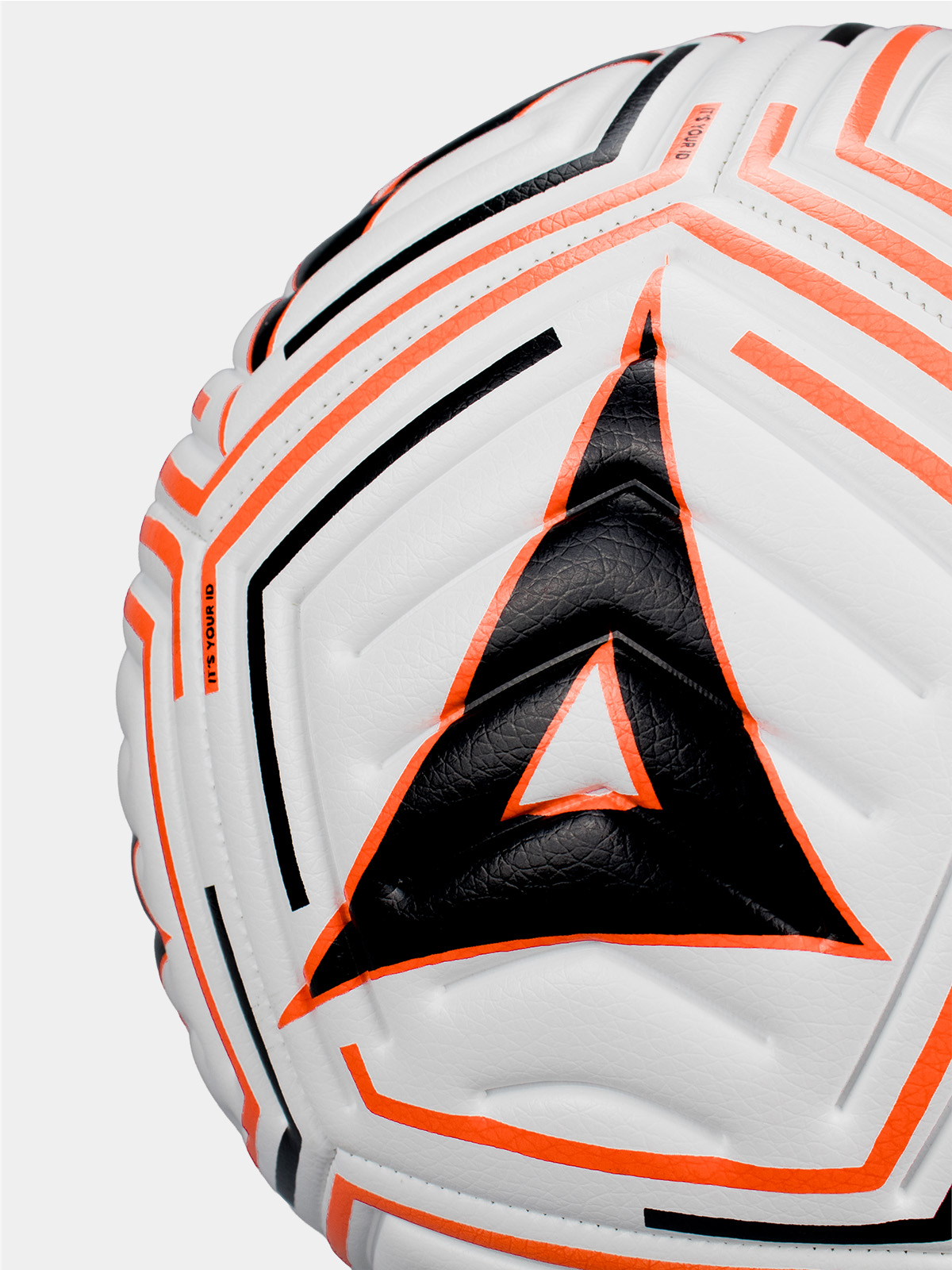 a white football with orange band black details
