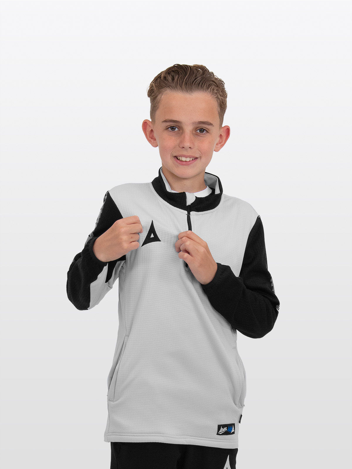 	a young child is wearing a soft feel grey jumper with black sleeves and details.