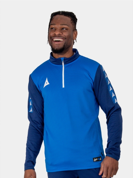 This royal blue and navy jumper is being worn by a man. The jumper has a white quarter zip design and navy funnel neck