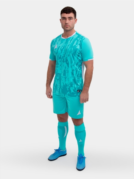 	A model standing up wearing a hyper blue football shirt, matching hyper blue Shorts and Football Socks.