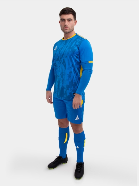 	A model wearing a royal blue football shirt, matching royal blue Shorts and royal blue Football Socks.