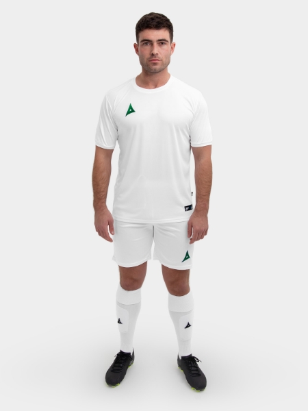 	The man in the image is wearing white shorts with a green logo