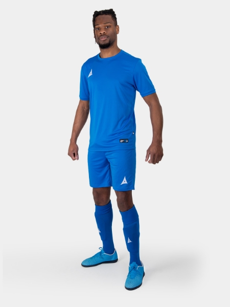 A person is wearing a royal football kit which consists of blue football shirts and shirt.