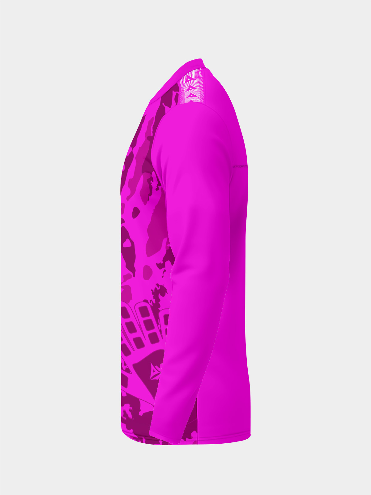 	side profile of the magenta goalkeeper shirt highlighting the ultra-mesh ventilation panels for airflow.