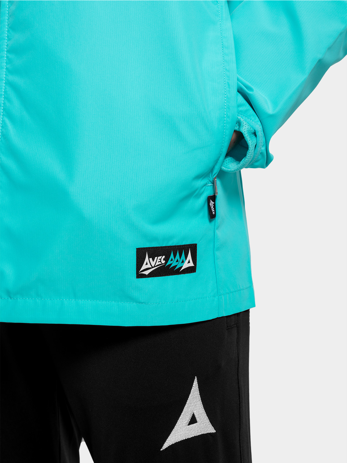 	close-up of the discreet zipped pockets on the hyper blue focus 2 jacket, ideal for grassroots coaching essentials.
