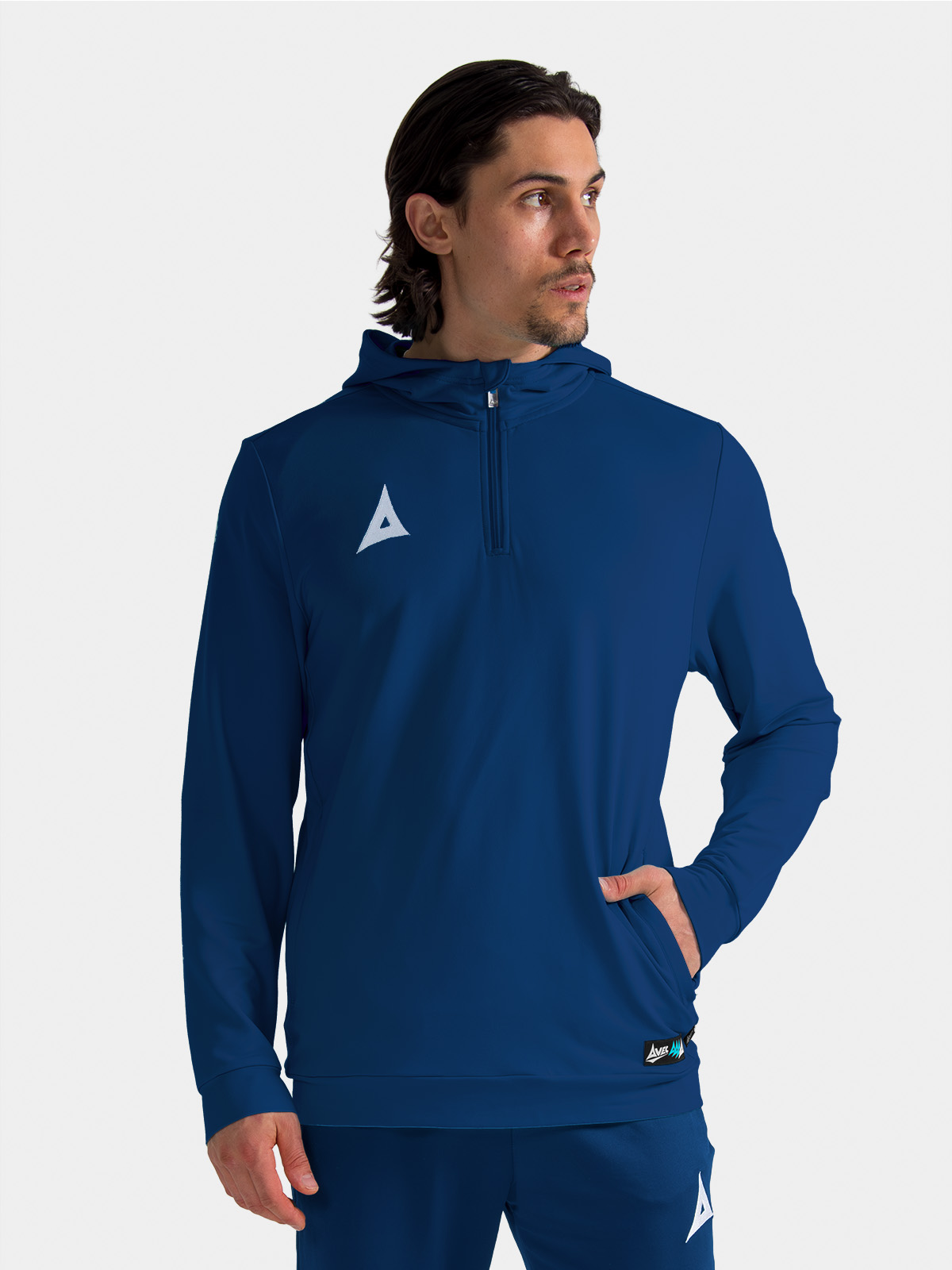 coach wearing the navy focus 2 qz hoody, demonstrating the smart and functional sideline aesthetic.