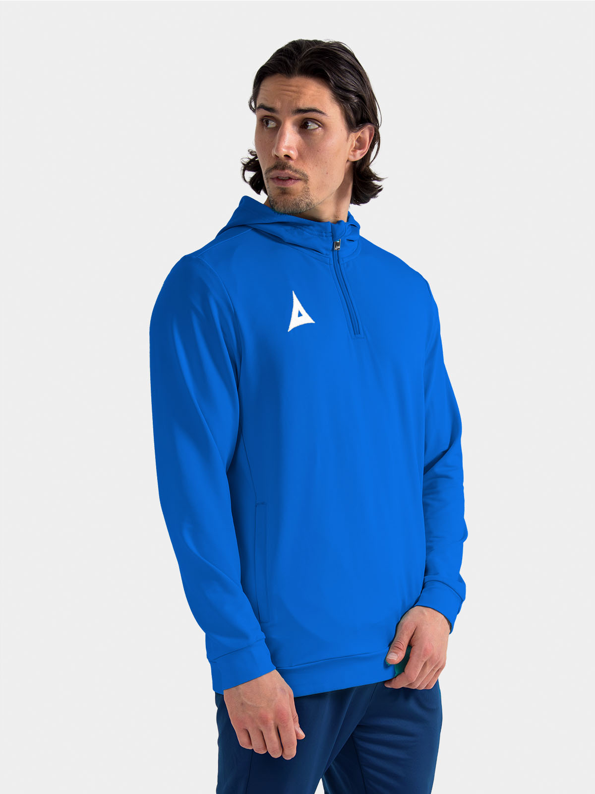	athlete in the royal blue focus 2 qz hoody, highlighting the vibrant colourway for club training.
