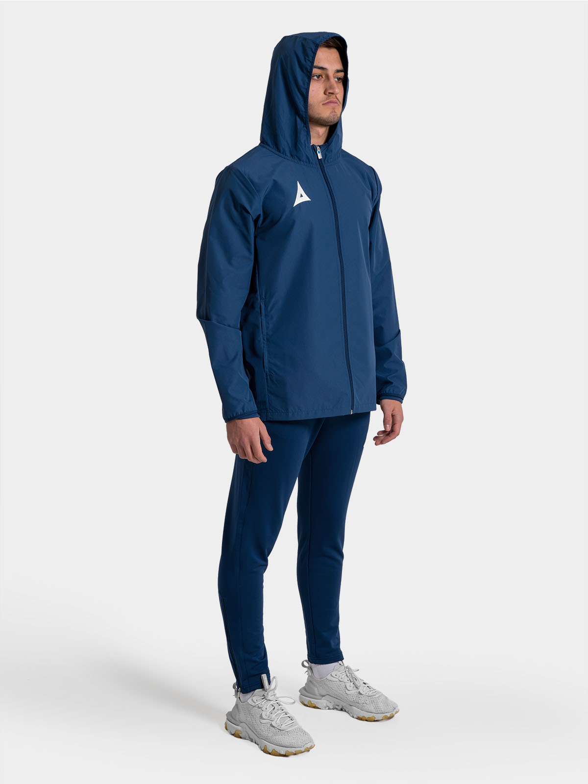 	full-body look of the navy focus 2 shell jacket, a dependable choice for club travel and sideline wear.