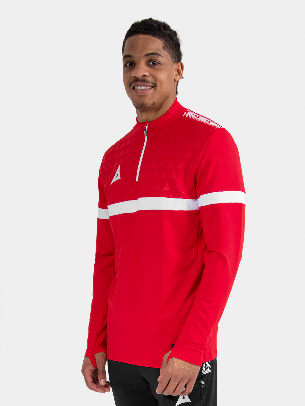 athlete wearing the red evolve pro overlay, demonstrating the lightweight feel and unrestricted range of motion.