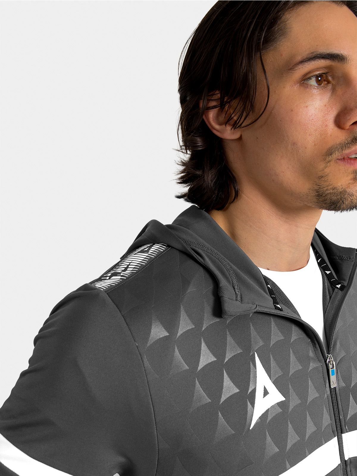 	close up view, showcasing the debossed 'a' logo. 