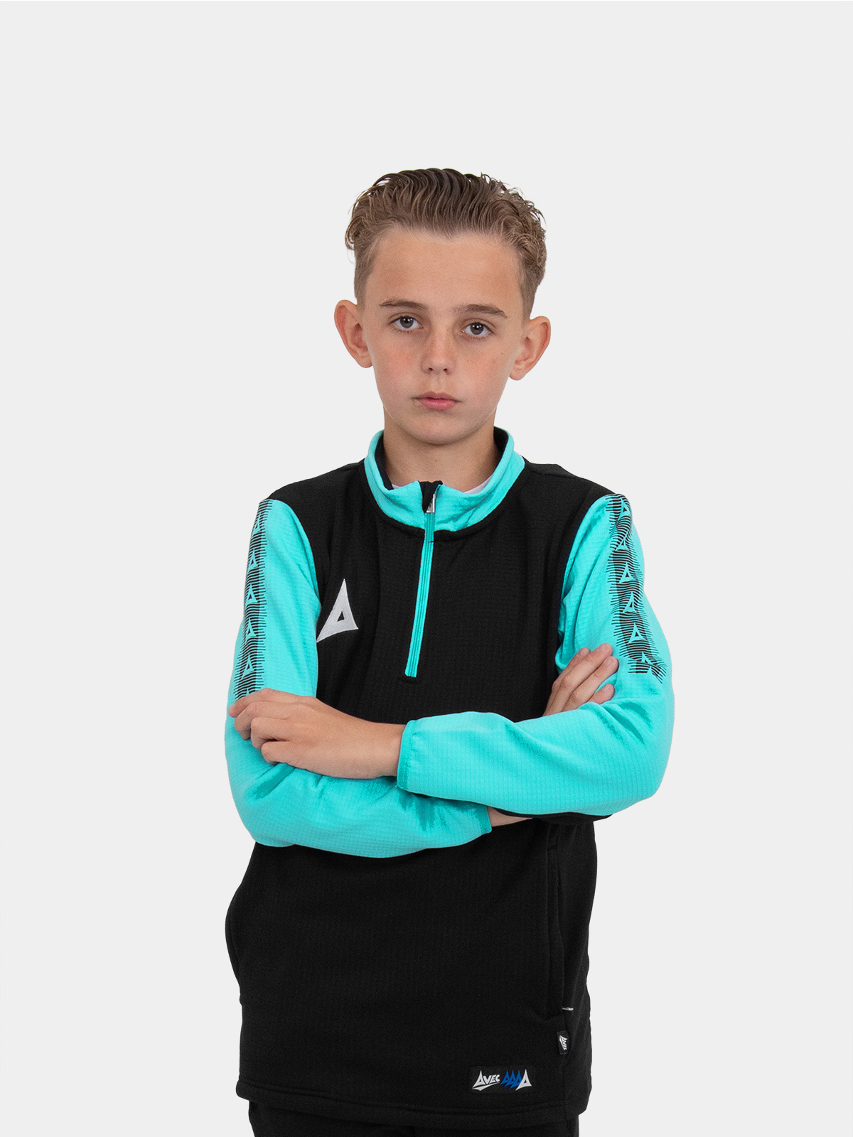 	a young child is wearing a black quarter-zip jumper with light blue sleeves