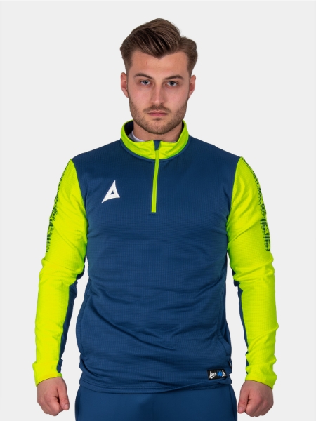 	A man wearing a navy jumper with bright yellow sleeves and collar.
