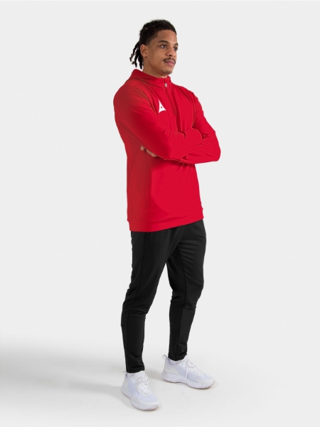 	Full Red training kit on-model, featuring the Focus 2 QZ hoody as a bold and professional layer.