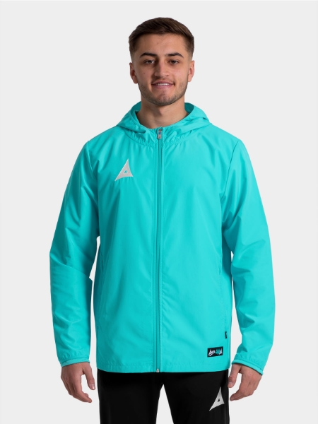 	Close-up of the Hyper Blue Focus 2 jacket on a model, highlighting the quality embroidered Heritage ‘A’ logo.