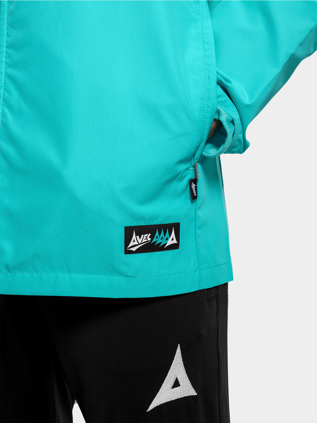 	close-up of the discreet zipped pockets on the hyper blue focus 2 jacket, ideal for grassroots coaching essentials.