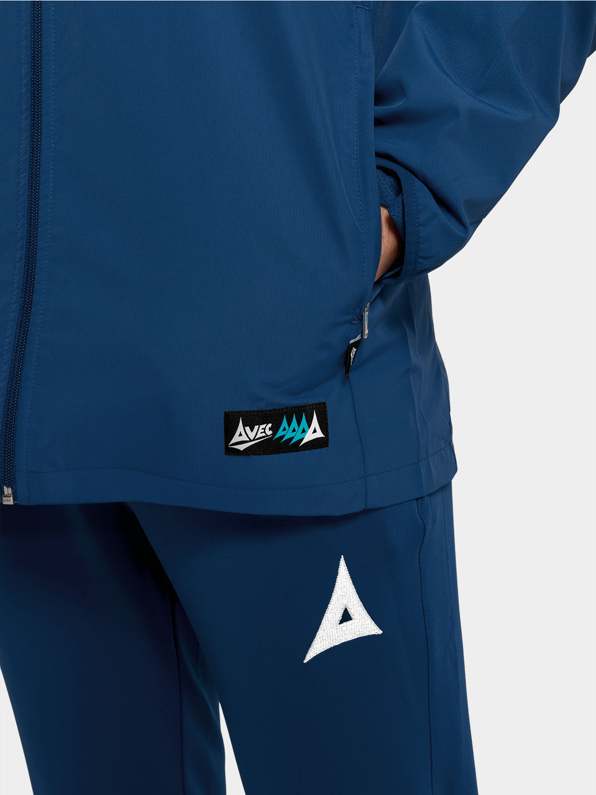 	detailed view of the zipped storage on the navy focus 2 jacket, designed for practical sideline use.